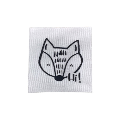 Baumwolllabel mit Aufdruck "Fuchskopf und Hi!" in schwarz auf weißem Hintergrund