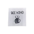 Baumwolllabel mit Aufdruck "Biene und bee kind" in schwarz auf weißem Hintergrund