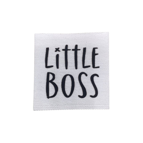 Baumwolllabel mit Aufdruck "little Boss" in schwarz auf weißem Hintergrund